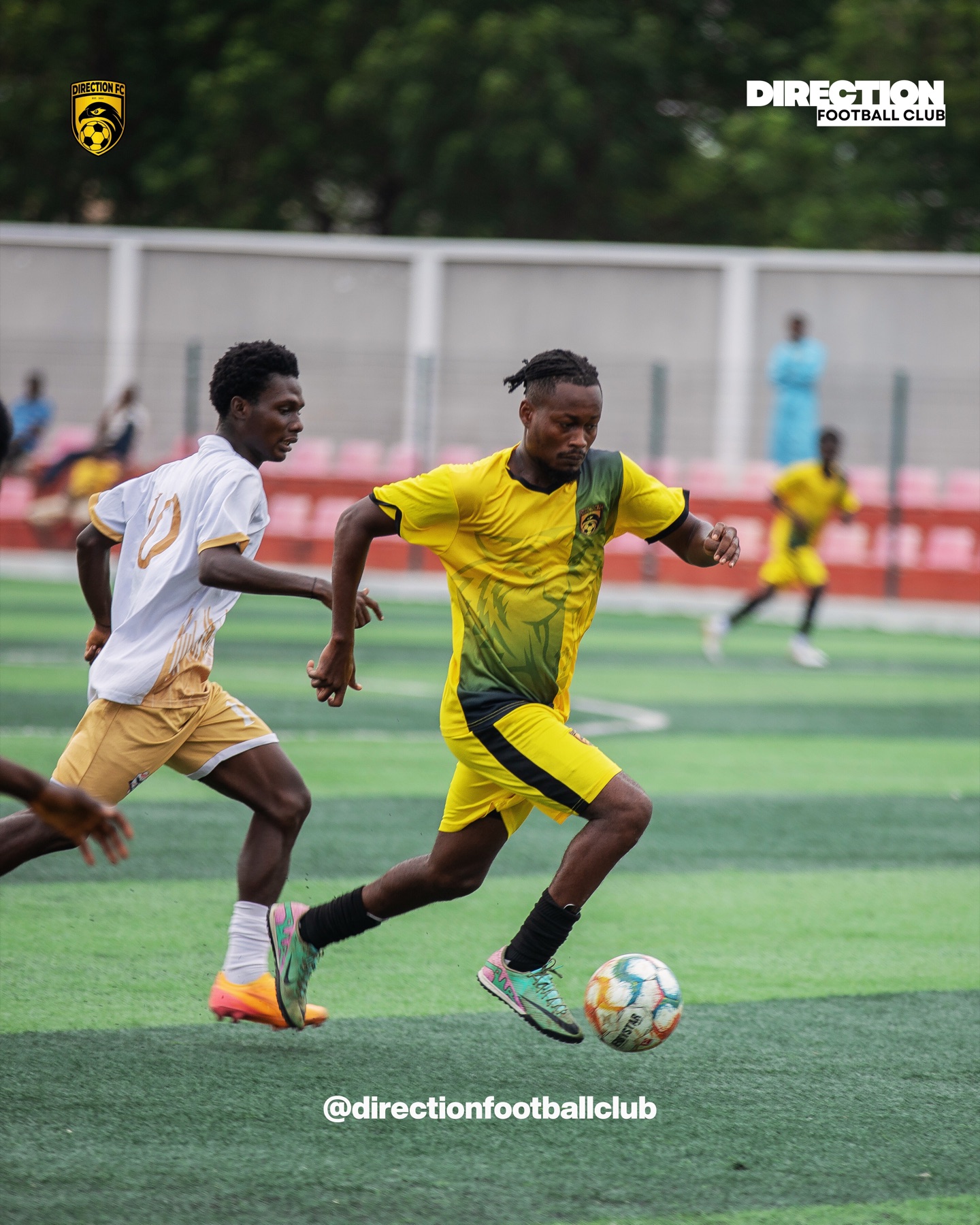 Direction FC player battling for the ball in a match.